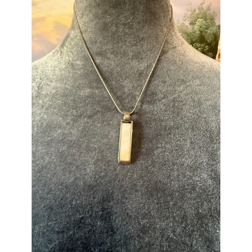 🌴Lia Sophia silver-tone reversible bar pendant white and black sides.